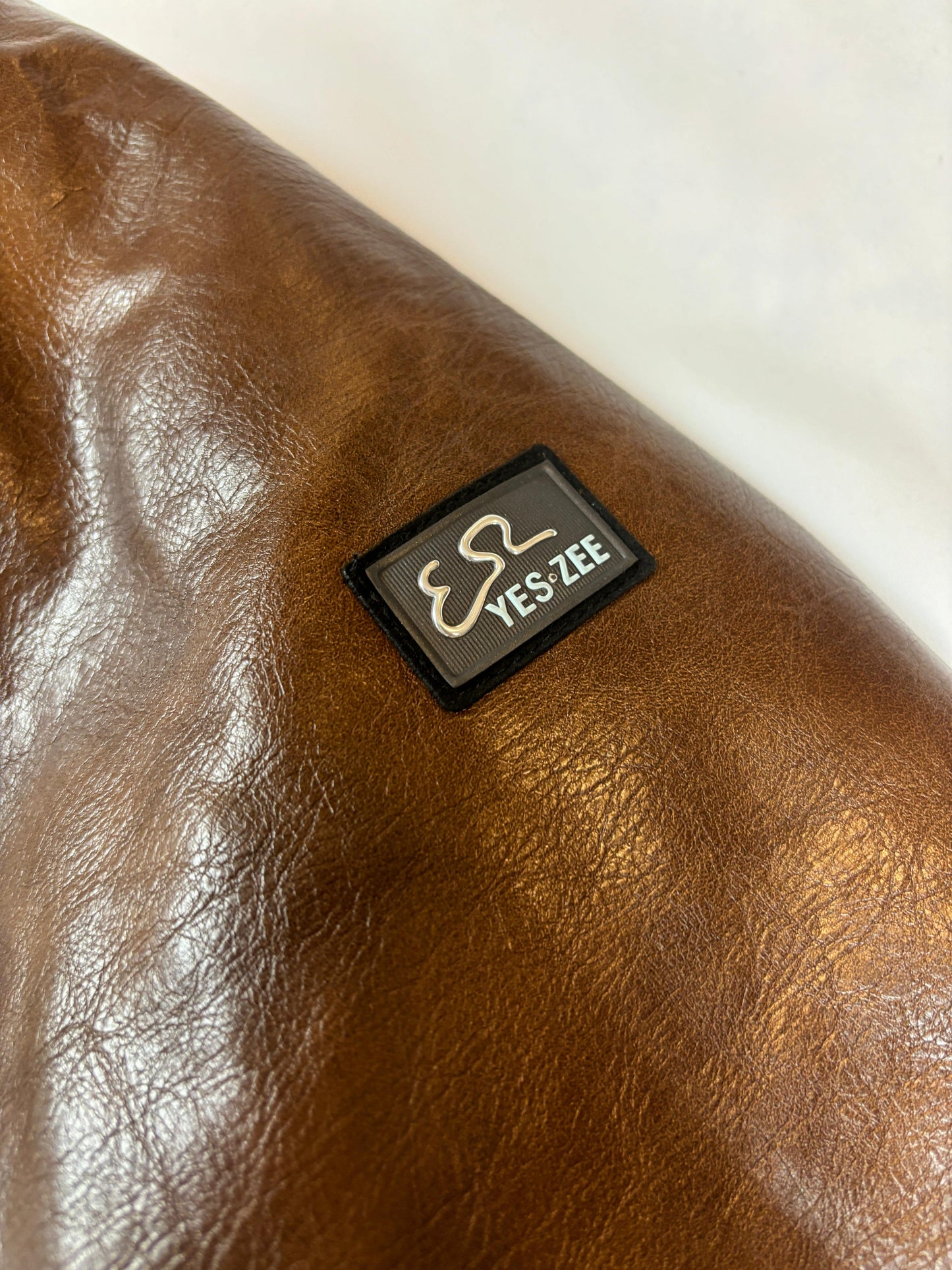 Giacca uomo in pu tipo bomber, effetto used